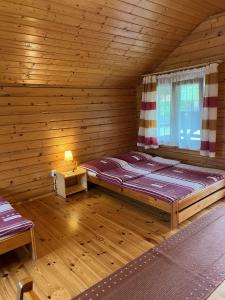 Domki "Na Dworskiej" Polańczyk 696-025-331