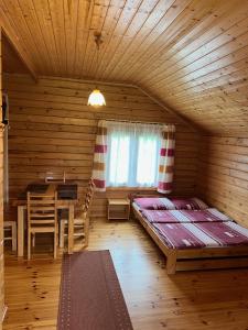 Domki "Na Dworskiej" Polańczyk 696-025-331