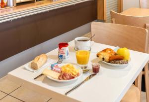 Hotels B&B HOTEL Pezenas : photos des chambres