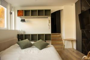 Appartements Suite Aube-Studio 2 pers lumineux centre ville : photos des chambres