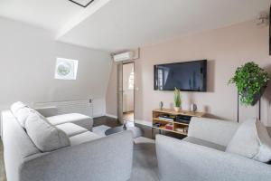 Appartement de 100m2 dans un parc à 20 mn du centre de Paris