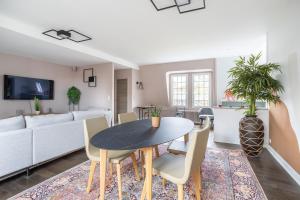 Appartement de 100m2 dans un parc à 20 mn du centre de Paris