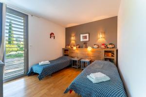 Villas Maison d-architecte avec piscine : photos des chambres