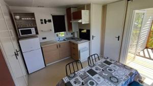 Campings Camping 3 etoiles - Piscine - ccbadeg : Mobile Home 1