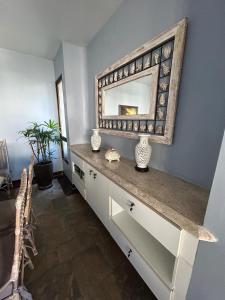 Apartamento Luxo Guarujá completo com piscina e churrasqueira na varanda