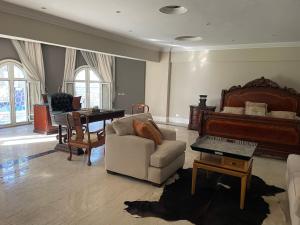 Condo in a Private Resort setting King Maryout Alamriyah Governorate Egypt Comes with an outdoor private infinity swimming pool with a large garden Borg Alarb International Airport is 15 minutes- Families Only