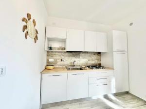 La Conchiglia, ristrutturato a due passi dal mare by Alfareal