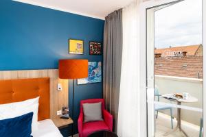 Premium Double Room with Balcony room in The Three Corners Lifestyle Hotel