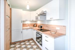 Appartements L-Ancre Normande - 7min a pied de la Plage : photos des chambres