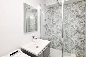 Appartements L-Ancre Normande - 7min a pied de la Plage : photos des chambres