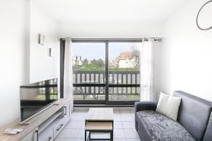 Appartements L-Ancre Normande - 7min a pied de la Plage : photos des chambres