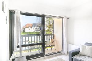 Appartements L-Ancre Normande - 7min a pied de la Plage : photos des chambres