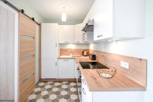 Appartements L-Ancre Normande - 7min a pied de la Plage : photos des chambres