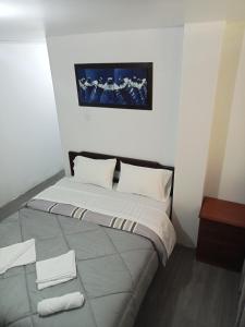 Habitación cama QUEEN 1B