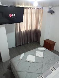 Habitación cama QUEEN