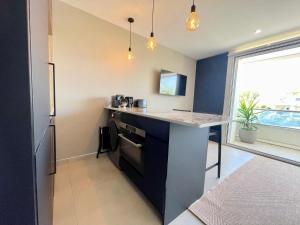 PGH N43 - Studio climatisé avec piscine