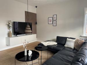 Stor lys lejlighed på 100 kvm, central beliggenhed