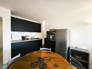 Appartements Echappee bleue, appartement vue mer proche de Tharon-Plage : photos des chambres