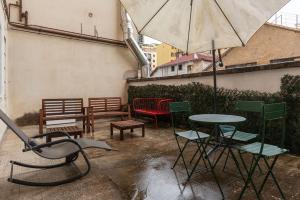 GuestHost - Cozy Ostiense Flat with Terrace!
