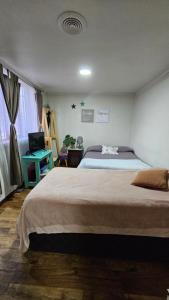 Habitacion Familiar Central independiente