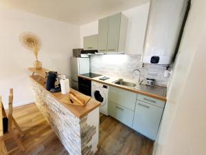 Appartements La Corderie - Centre Ville - Parking : photos des chambres