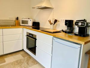 Maisons de vacances La maison de l-Orangerie - Charm & comfort in the very heart of Carentan : photos des chambres