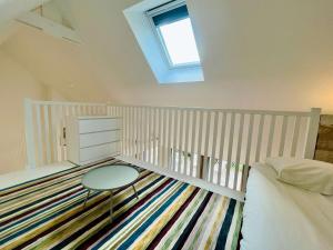 Maisons de vacances La maison de l-Orangerie - Charm & comfort in the very heart of Carentan : photos des chambres