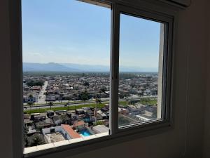 Apê Tupi c Wi-Fi e vaga a 600m da praia!