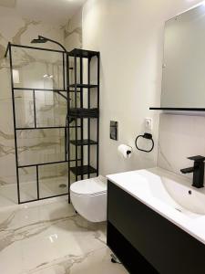 Appartements Suite Charles - 2 pers chic & intemporelle : photos des chambres