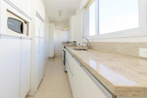 Apê decorado em Jurerê, perto da praia VJ8376