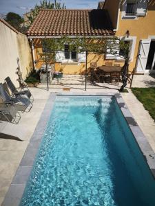 Villas Belle maison familiale avec piscine, city stade, et nombreuses activites : photos des chambres