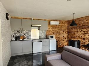 Maisons de vacances Le Petit Gite 15140 : photos des chambres