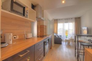 Cosy 2 pièces dans résidence avec piscine