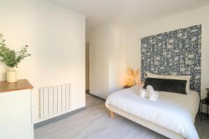 Appartements IDEAL Pro & Familles - Ambiance Nature - Cite des Affaires : photos des chambres