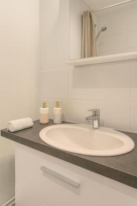 Appartements IDEAL Pro & Familles - Ambiance Nature - Cite des Affaires : photos des chambres