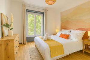 Appartements IDEAL Pro & Familles - Ambiance Nature - Cite des Affaires : photos des chambres