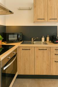 Appartements IDEAL Pro & Familles - Ambiance Nature - Cite des Affaires : photos des chambres