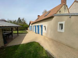 Maisons de vacances Aux Premieres Loges - Gite de charme proche du circuit : photos des chambres
