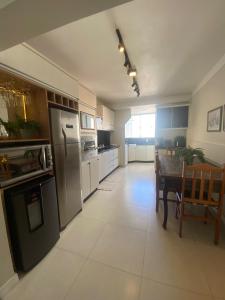 Apto 04 quartos no calçadão central de BC