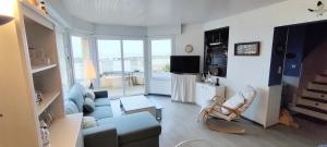 Vent dange maison familiale face à la mer