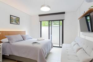 Apartamento garden super moderno próximo ao Jardim Botanico e à Rodoviária - Cama QueenWIFIAr Condicionado