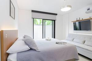 Apartamento garden super moderno próximo ao Jardim Botanico e à Rodoviária - Cama QueenWIFIAr Condicionado