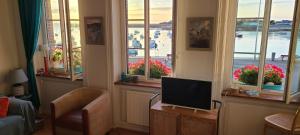 Appartements Appartementde charme en duplex face au port de Barfleur : photos des chambres