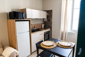 Appartements Appartement chaleureux & confort, parking prive : photos des chambres