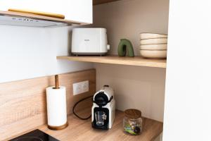 Appartements Appartement chaleureux & confort, parking prive : photos des chambres