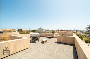 Sunny, modern villa with terraces and garden