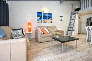 Beachfront 1BR and Loft Bliss Surf Cafe Escape