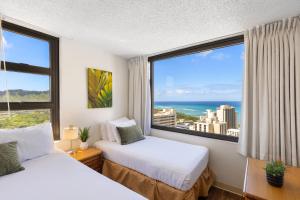 Sky-High Oceanview Escape at Waikiki Banyan with Free Parking (23214)
