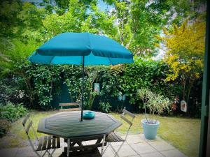 Appartements La Clef du Bonheur - 9 Min de Disney Jardin privatif : photos des chambres
