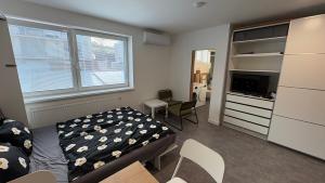 Apartmán pre 2 osoby s parkovaním blízko centra